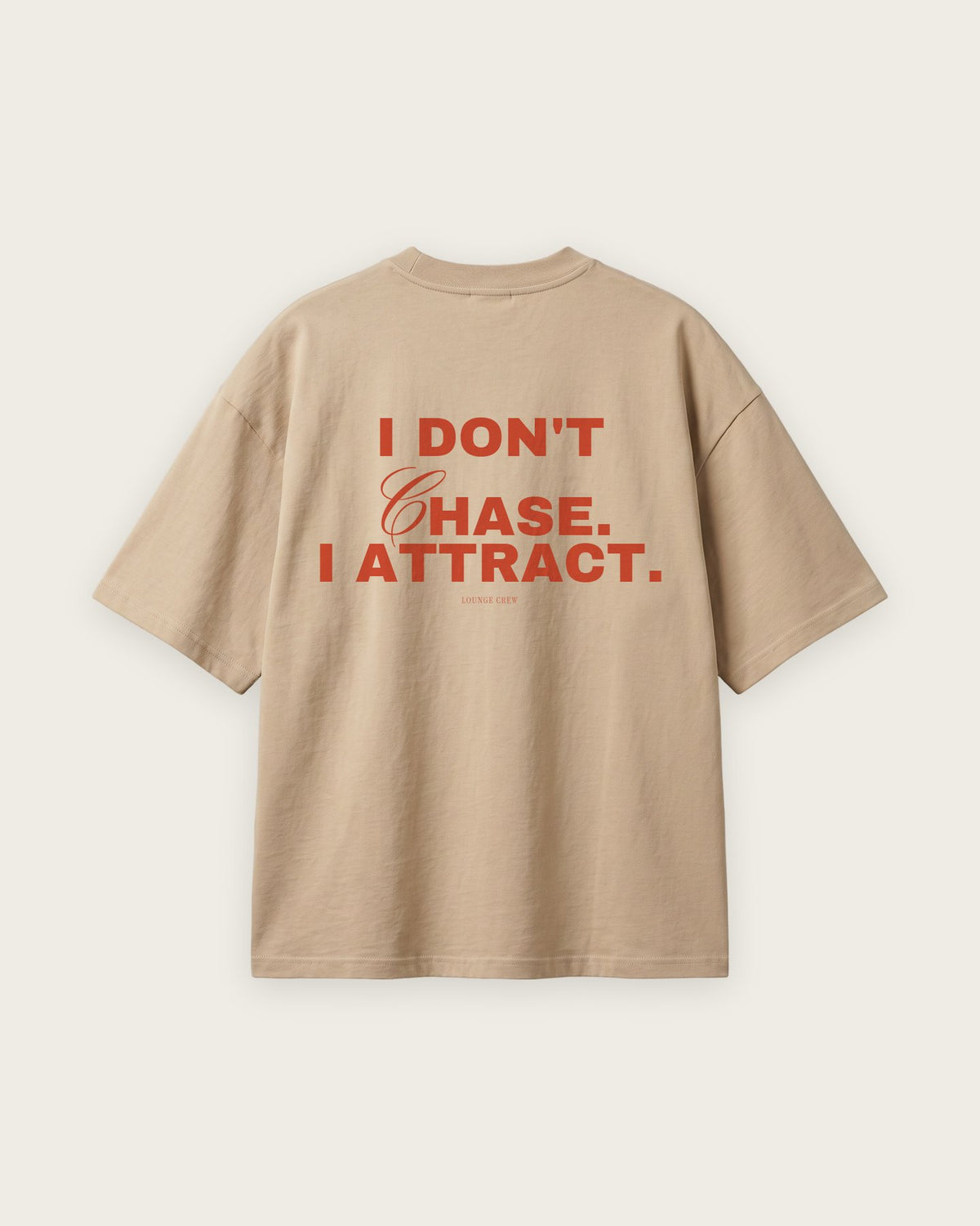 Camiseta Oversized “I Don't Chase, I Attract” — Areia