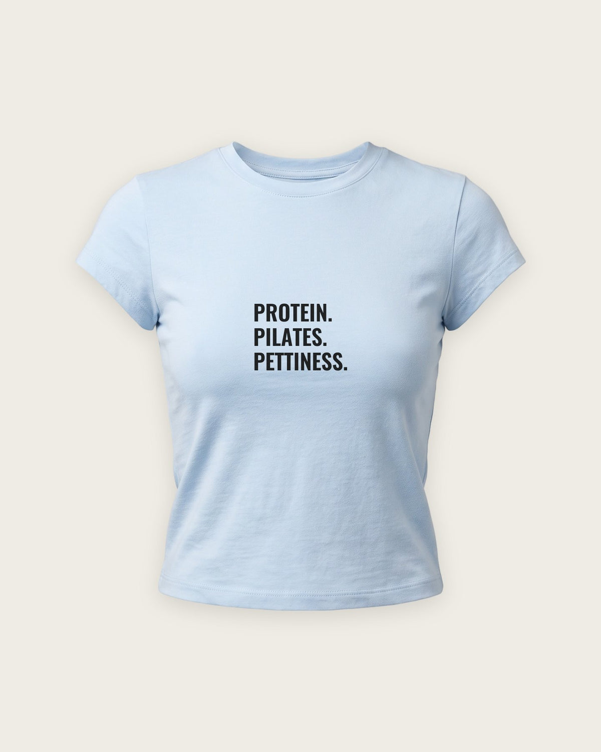 Baby Tee “Protein, Pilates, Pettiness” — Azul Bebê