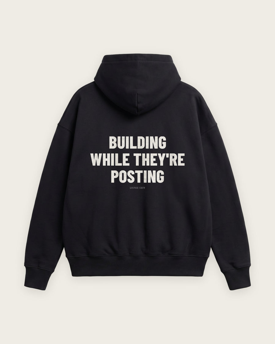 Moletom Oversized “Building While They're Posting”